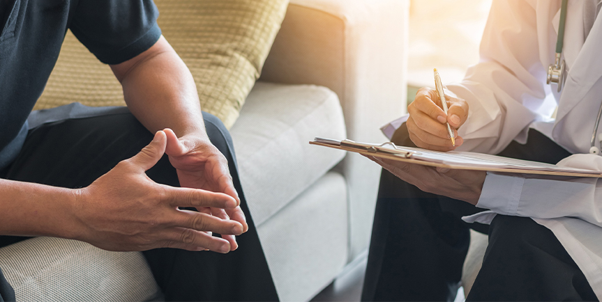 Physician meeting with a patient