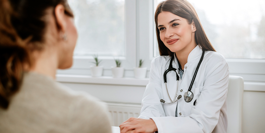 Physician speaking with a patient